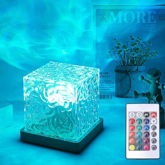 Ocean wave aurora projector casting rippling colour across a wall