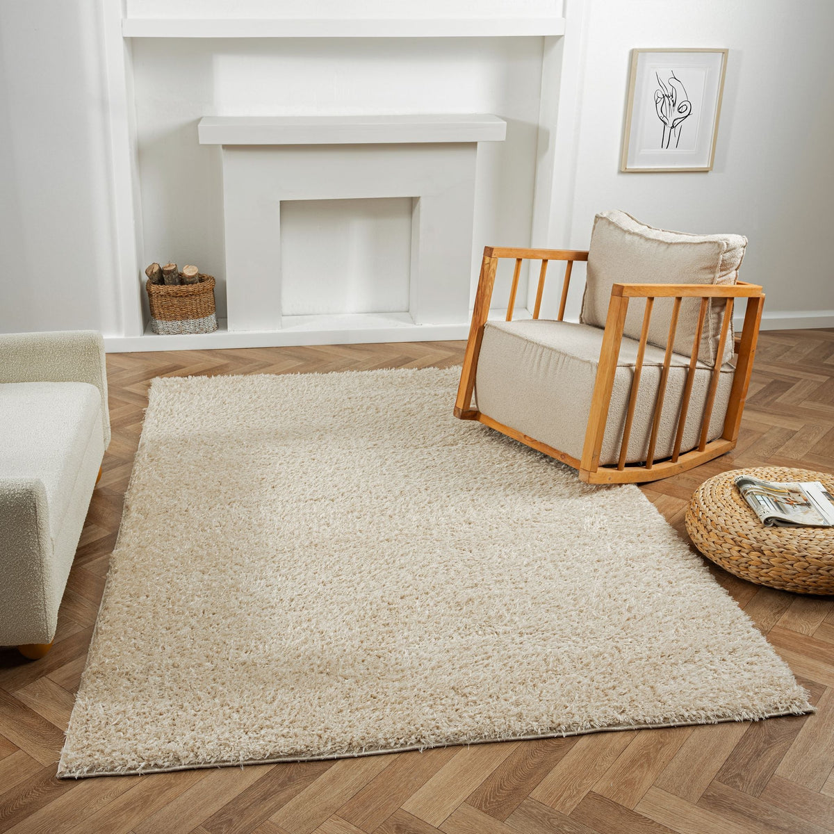 Beige shaggy area rug with a deep pile, laid in a living room